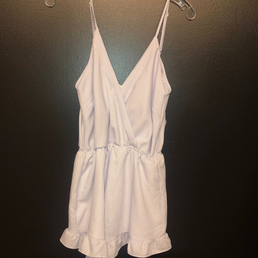 Light blue and white striped romper, with a bow in the back (you can untie bow)